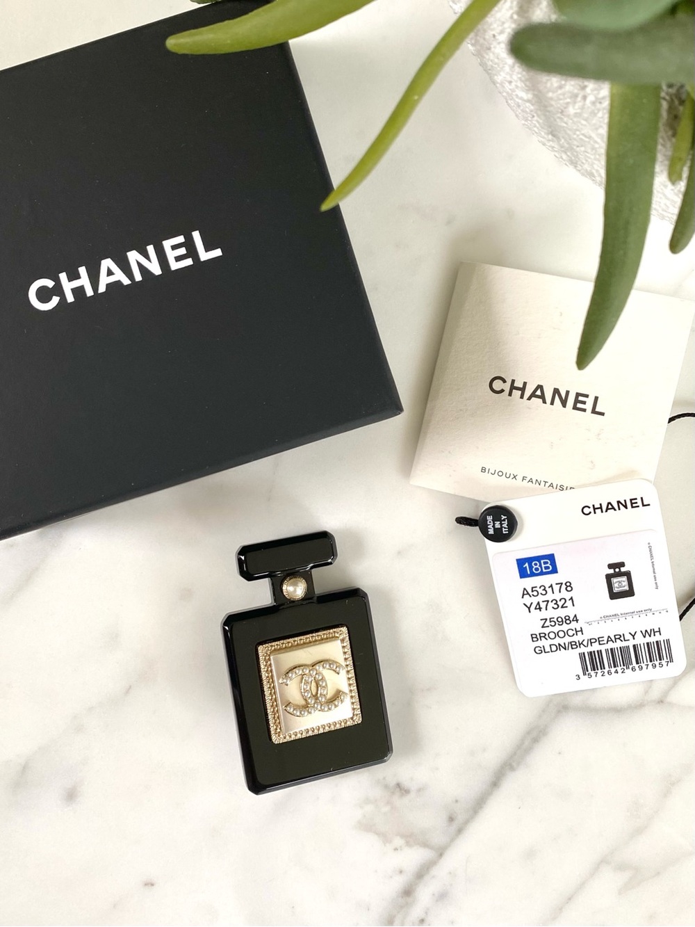 CHANEL - CC Perfume Bottle Pearl Brooch Pin from 2018